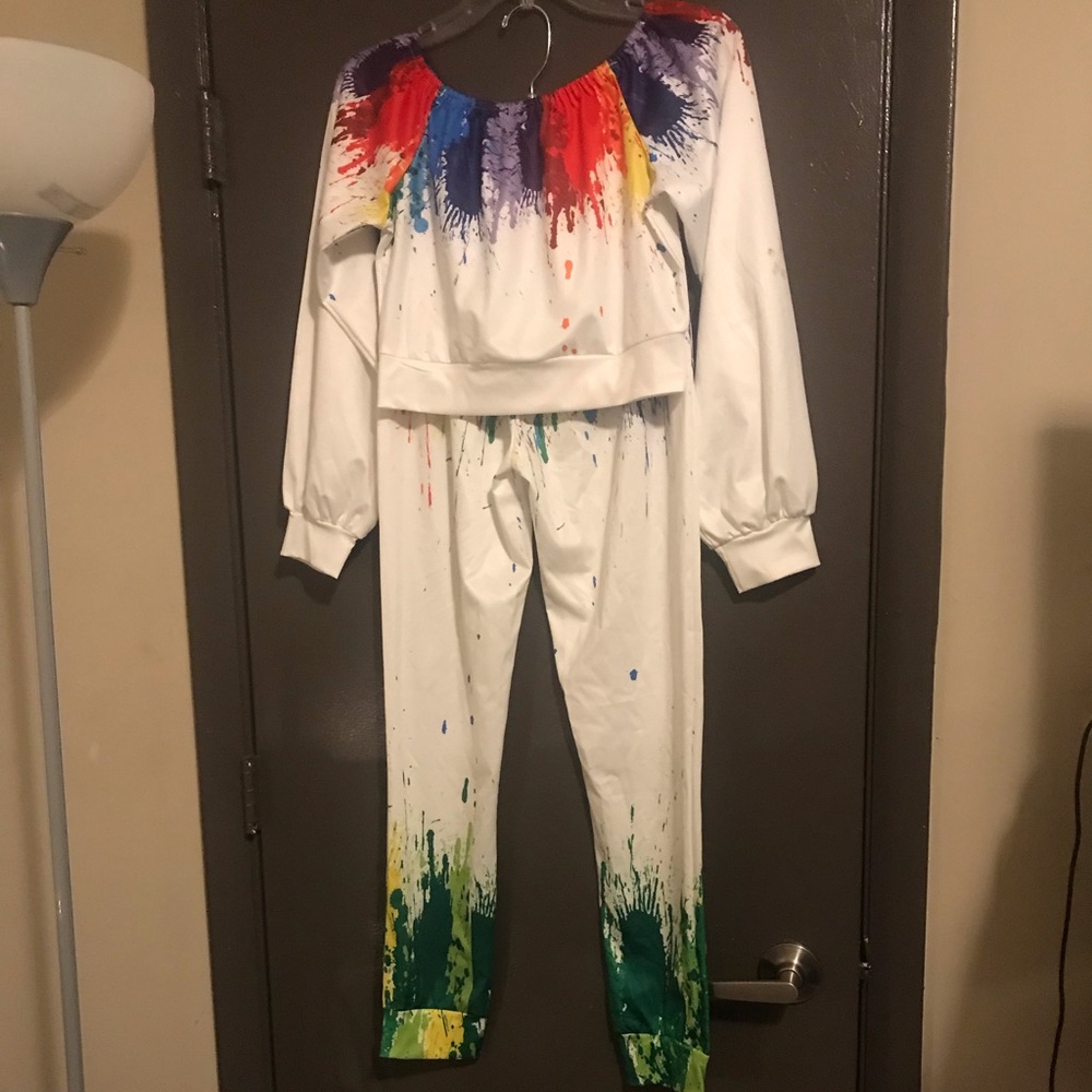 crop top with matching pants. high waist pants stretchy/silky material .